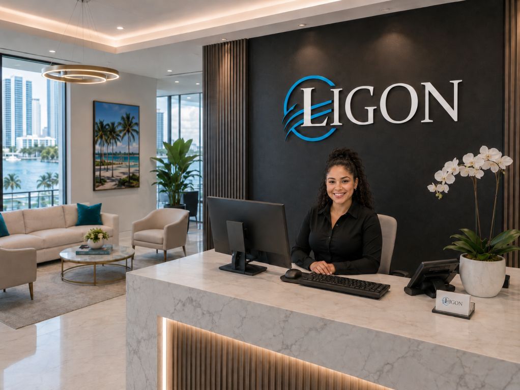 Nadia at The Ligon Group front lobby desk welcoming real estate investment inquiries and contacts
